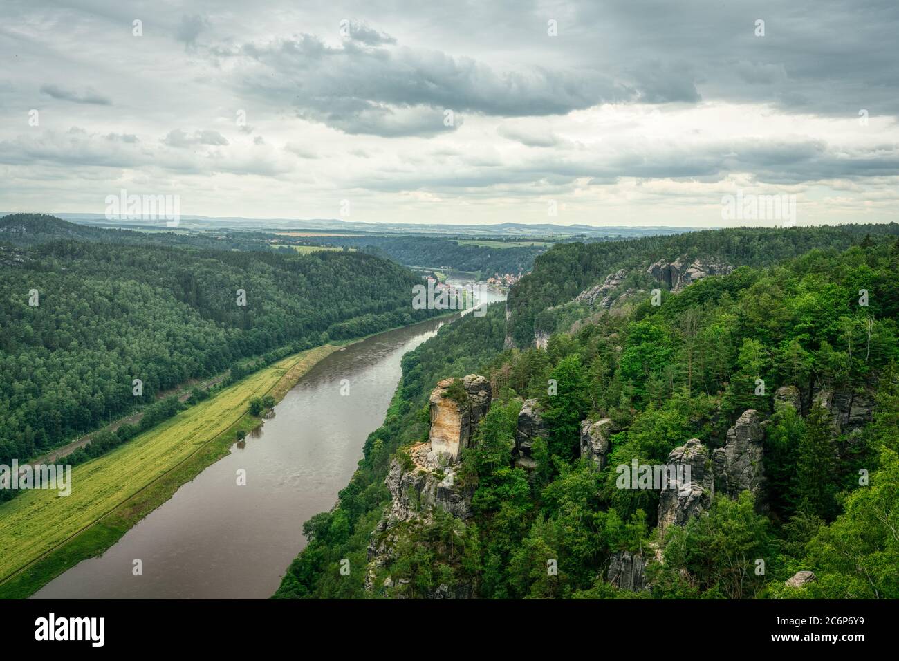 View of the river Elbe from Bastei sandstone mountains in Saxon Switzerland on a cloudy summer day Stock Photo