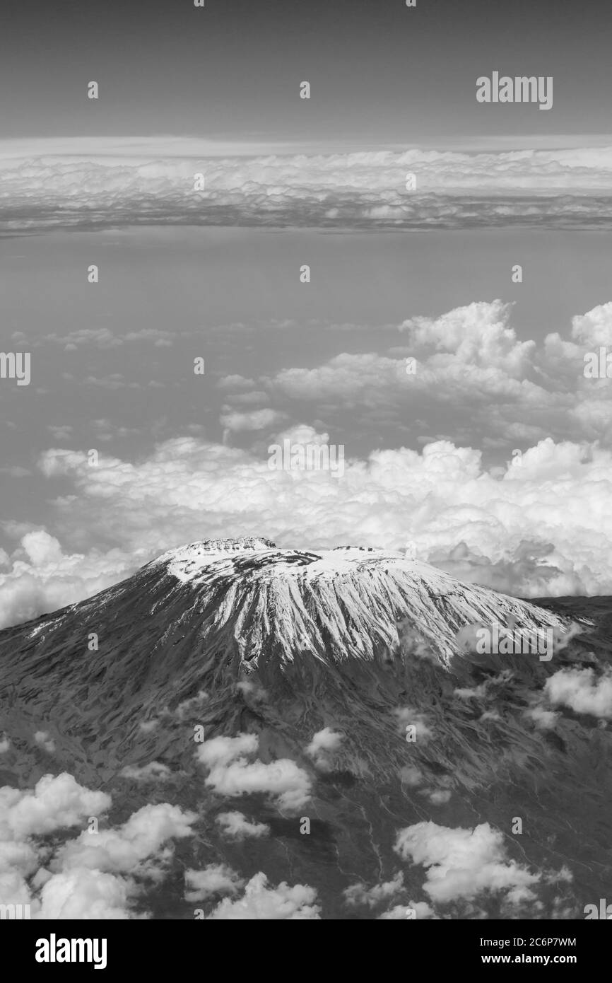A vertical black and white photograph of   an aerial view of Mount Kilimanjaro Stock Photo
