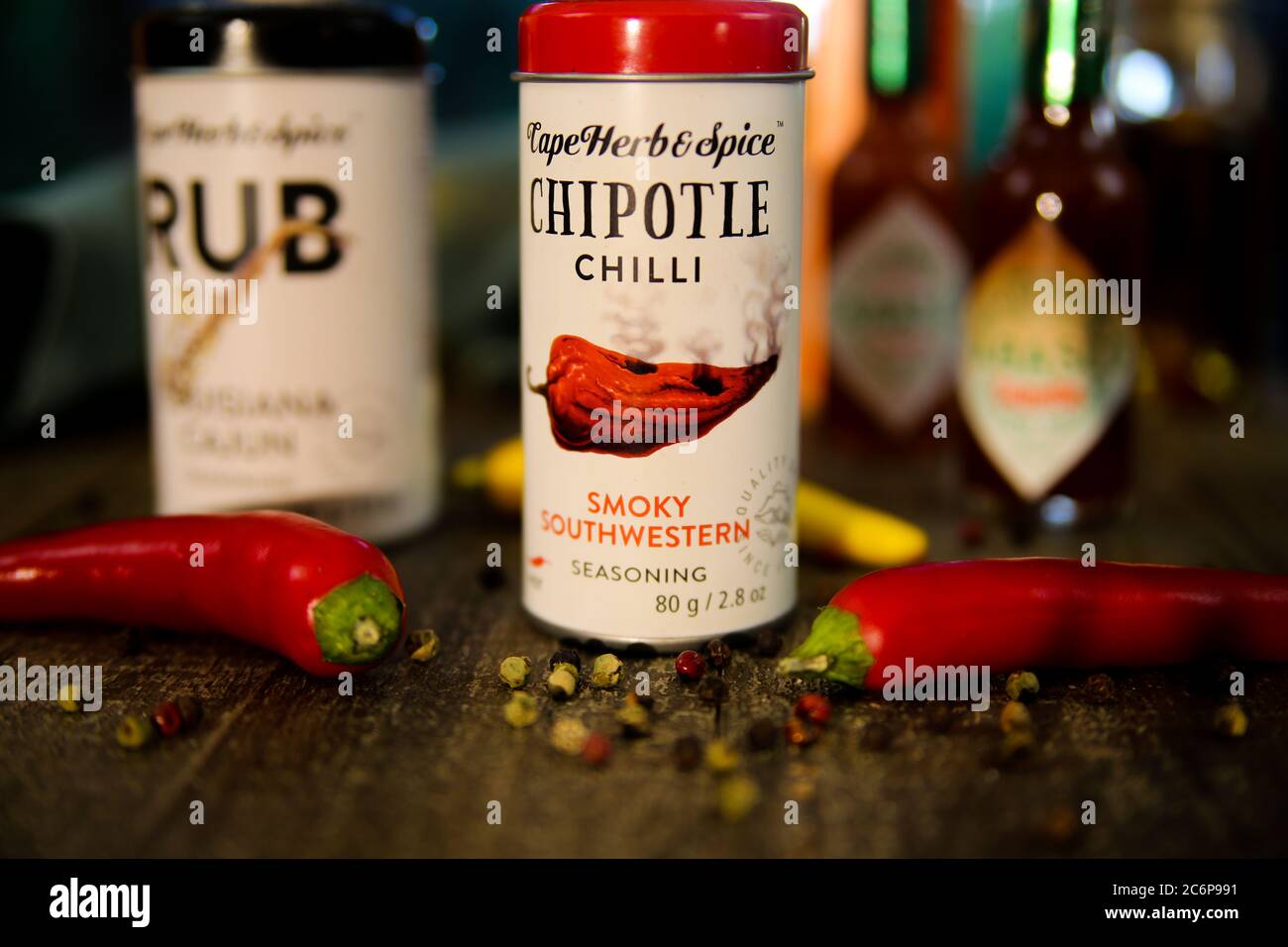 Viersen, Germany - July 9. 2020: View on isolated can smoky southwestern chipotle chilli pepper seasoning on table. (Focus on center of tin) Stock Photo