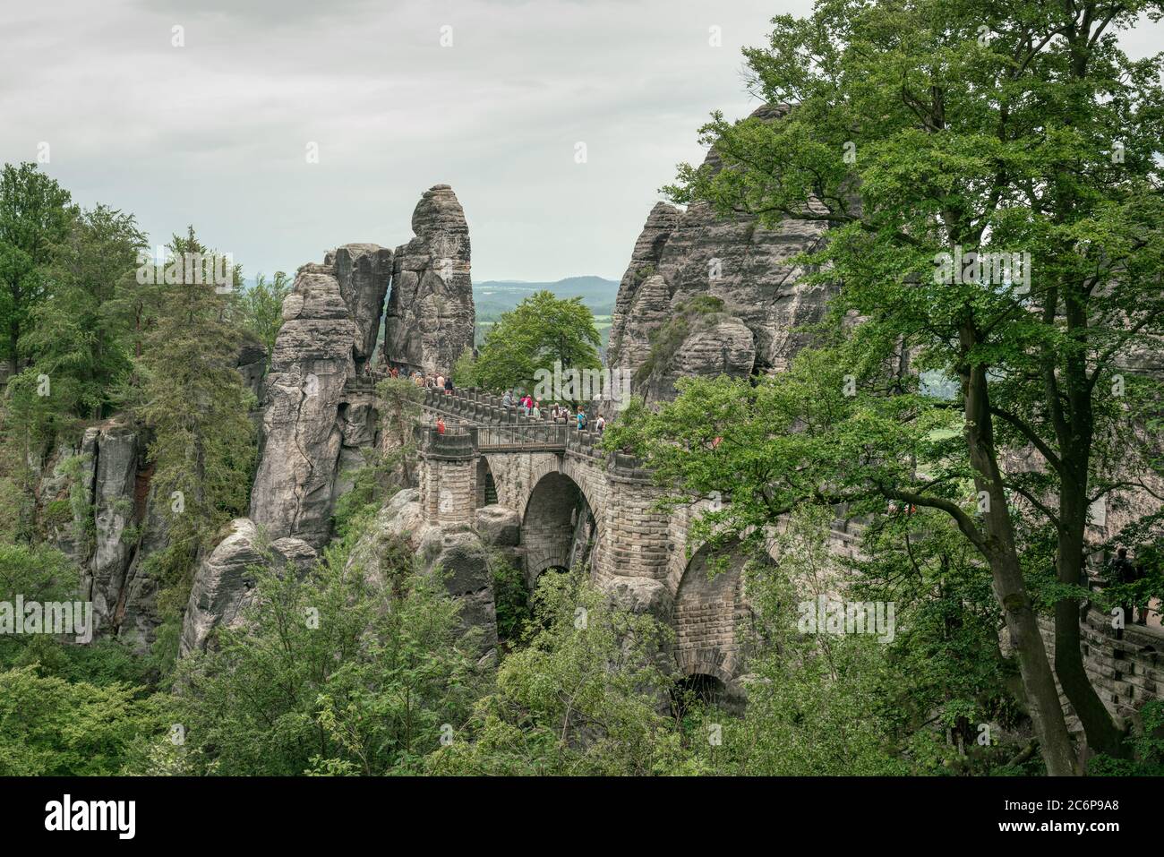 Tourists visiting Bastei bridge and rocks at Saxon Switzerland National Park in Germany Stock Photo