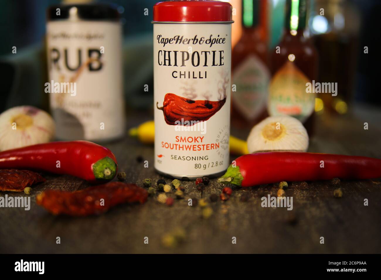 Viersen, Germany - July 9. 2020: View on isolated can smoky southwestern chipotle chilli pepper seasoning on table. (Focus on center of tin) Stock Photo