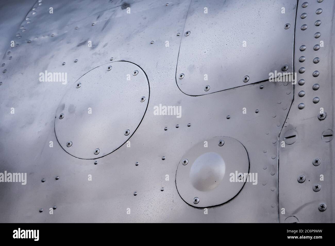 Old military fuselage close up rivet hires stock photography and