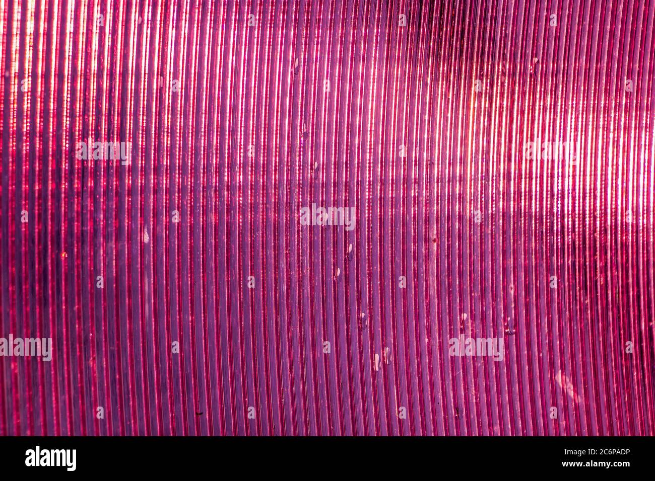 Texture of shiny pink plastic closeup Stock Photo