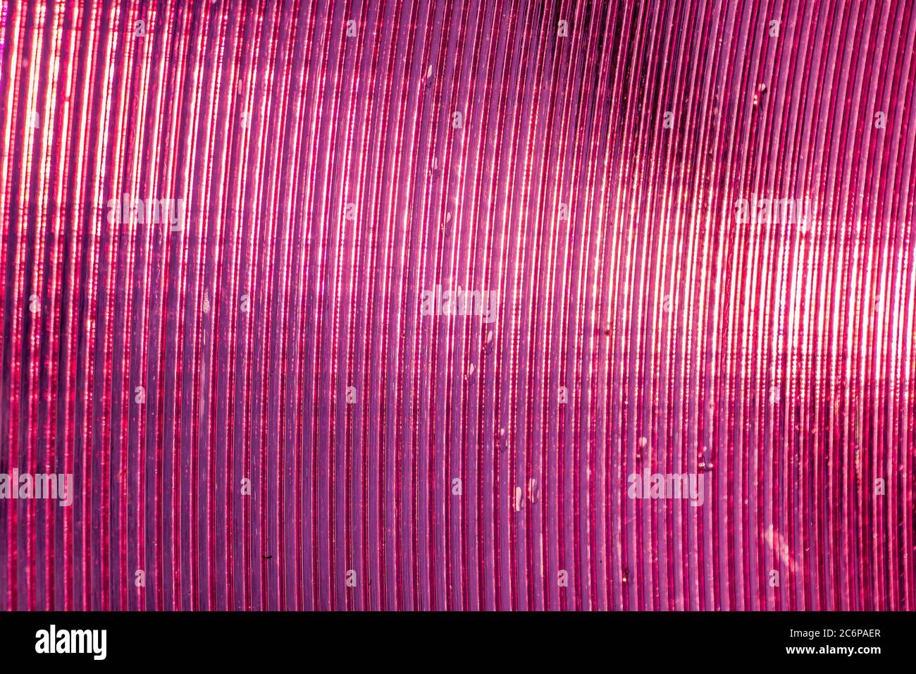 Texture of shiny pink plastic closeup Stock Photo