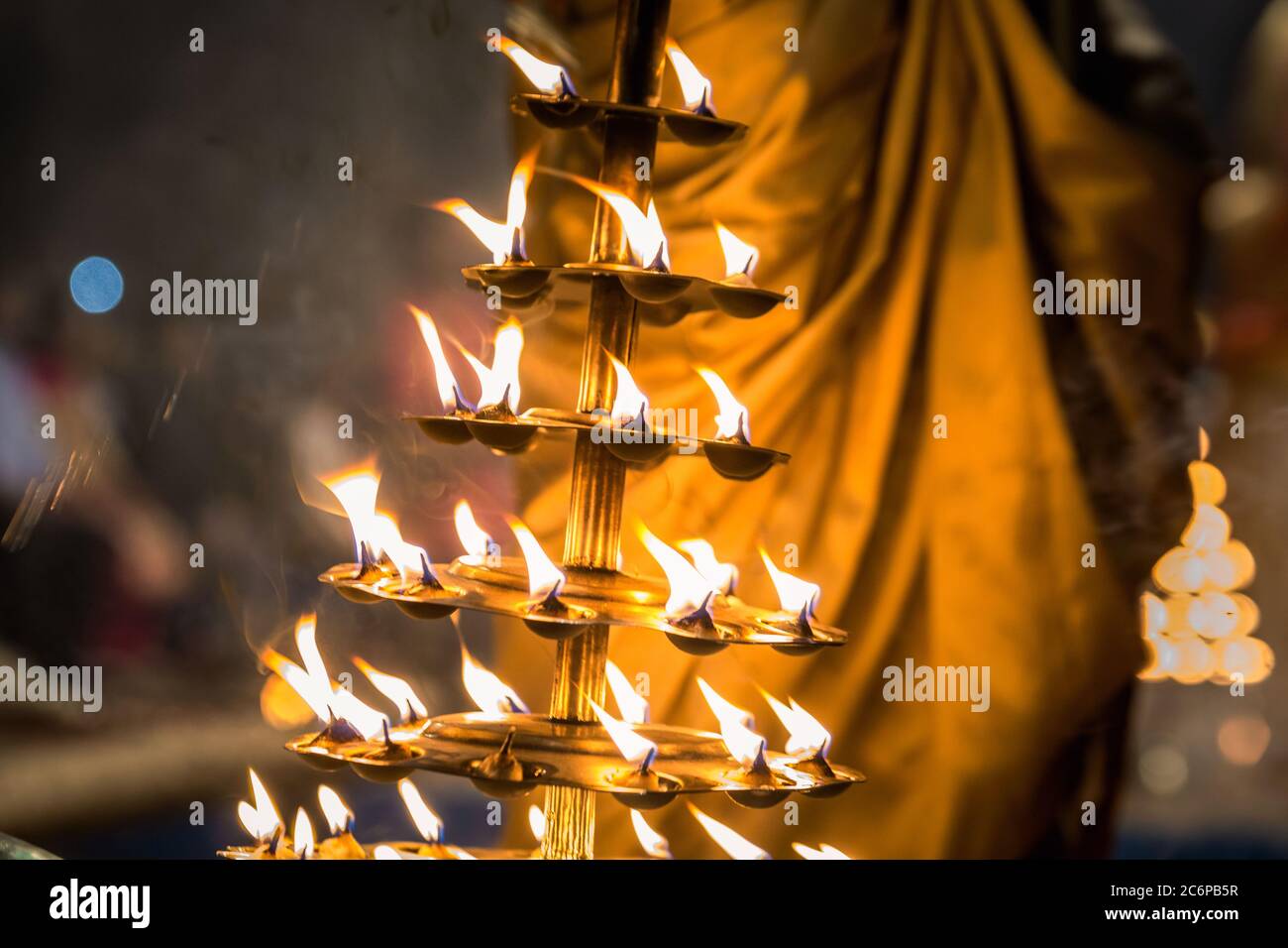 Candles used in performance of religious Ganga Aarti ritual fire puja ...