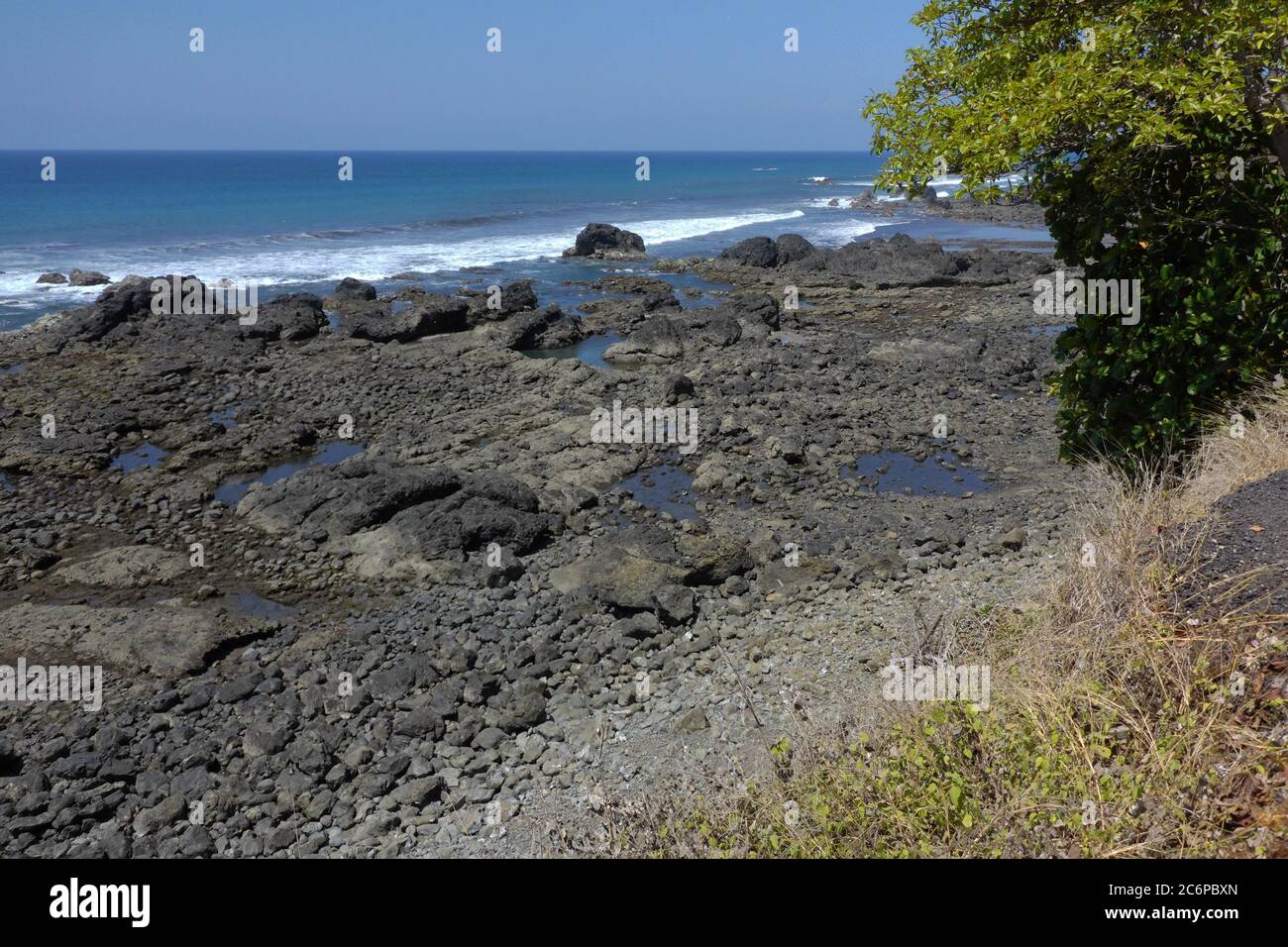 Stony coast at Playa Hermosa in Costa Rica, Central America Stock Photo