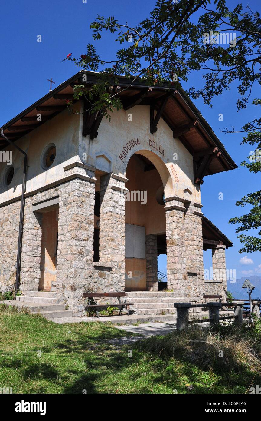 The hilltop church of Madonna della Neve at Mottarone above the cable car Stock Photo