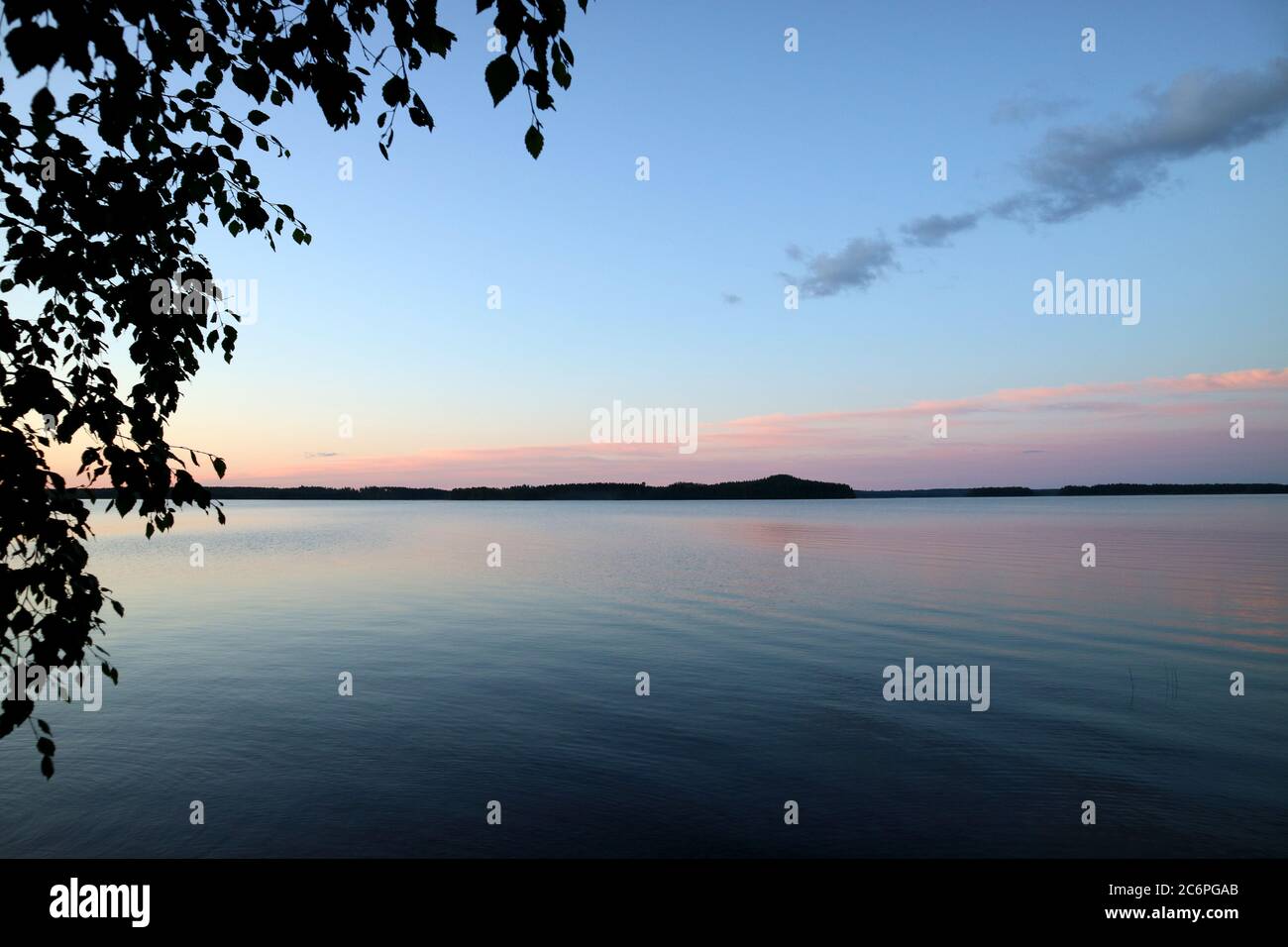 Serene sunset at Puruvesi lake in Kerimäki, Finland Stock Photo