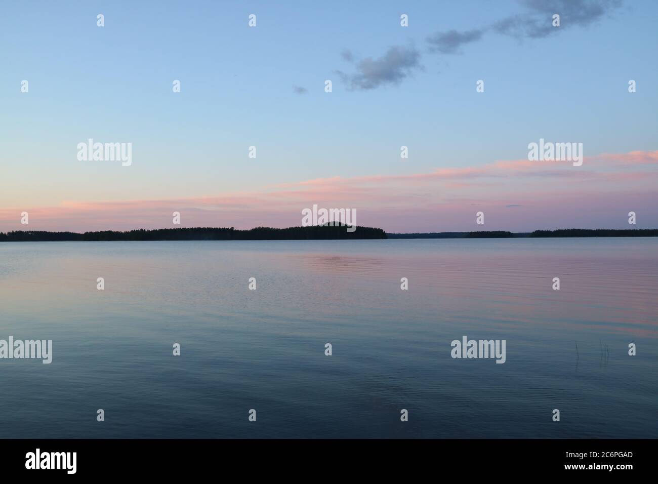 Serene sunset at Puruvesi lake in Kerimäki, Finland Stock Photo