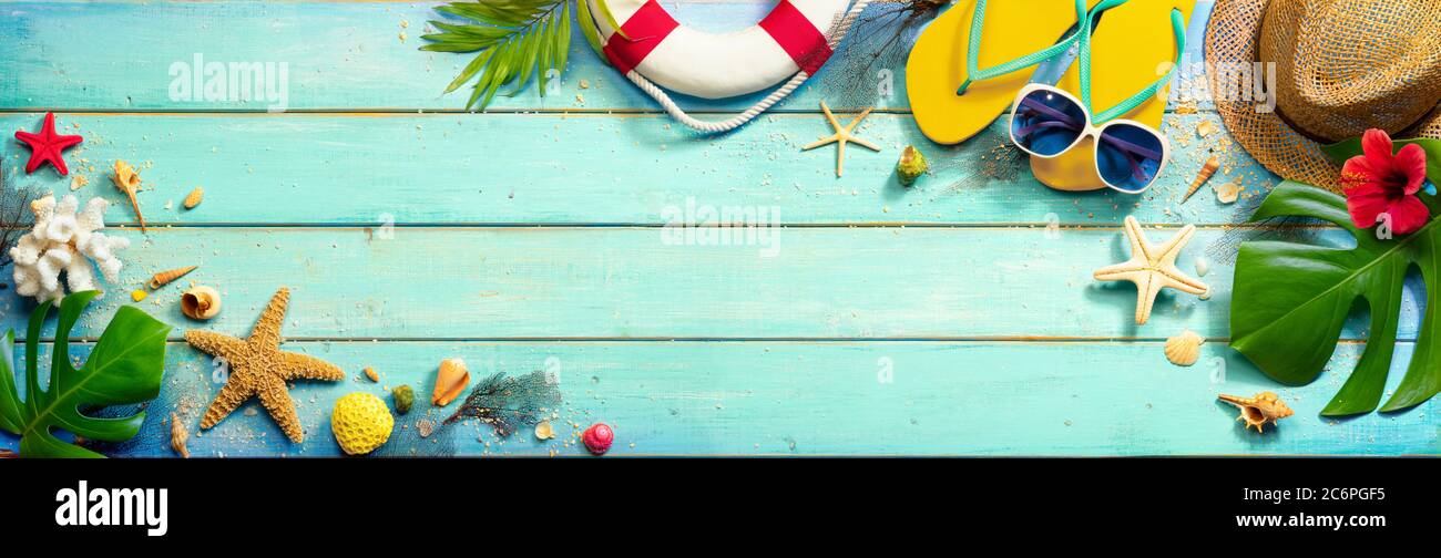 Beach Accessories On Mint Green Plank - Summer Background Stock Photo