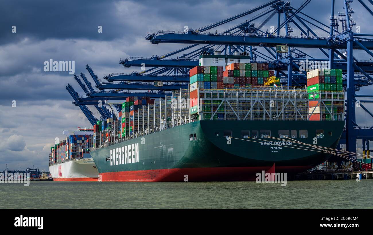 Evergreen Container Ship - the Taiwanese owned Evergreen Container Vessel Ever Govern unloads shipping containers at Felixstowe Port, UK. Stock Photo