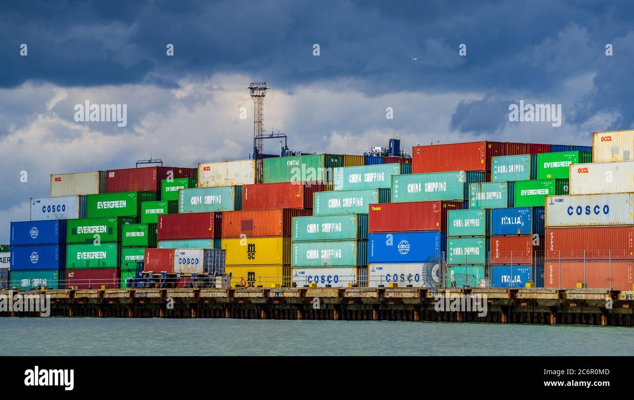 China UK Trade - China Shipping and Cosco containers unloaded at Felixstowe Port, UK Stock Photo