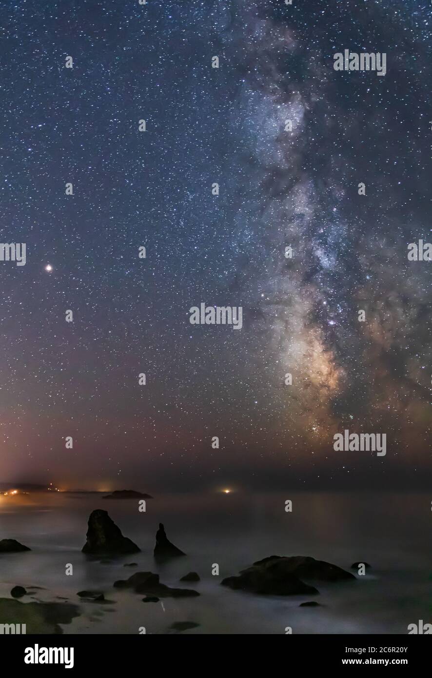 Vertical Image - Milky Way Galaxy above Bandon Beach in Oregon Stock Photo
