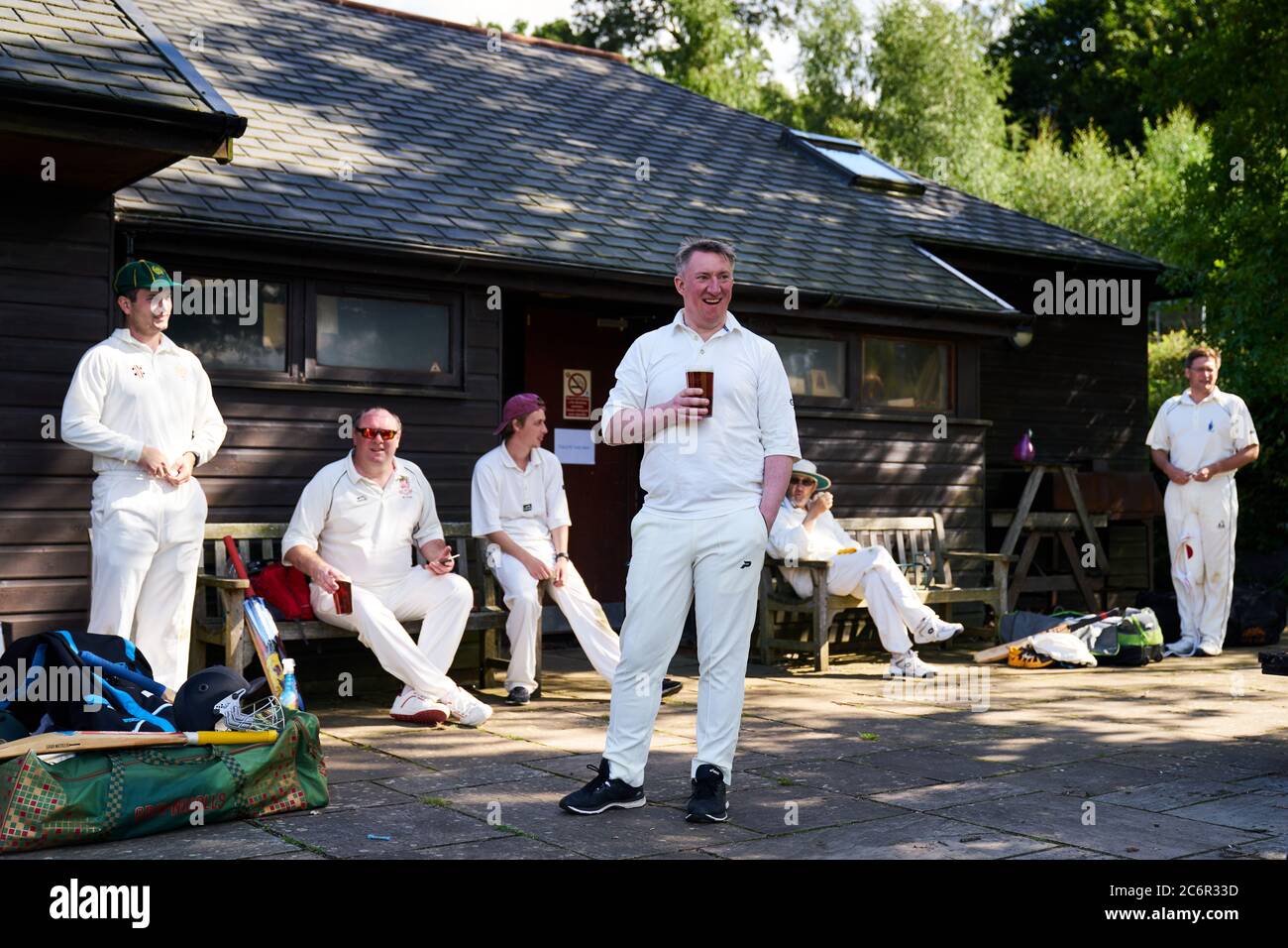Abinger Hammer Cricket Club play Worplesdon & Burpham cricket club, Surrey. Stock Photo