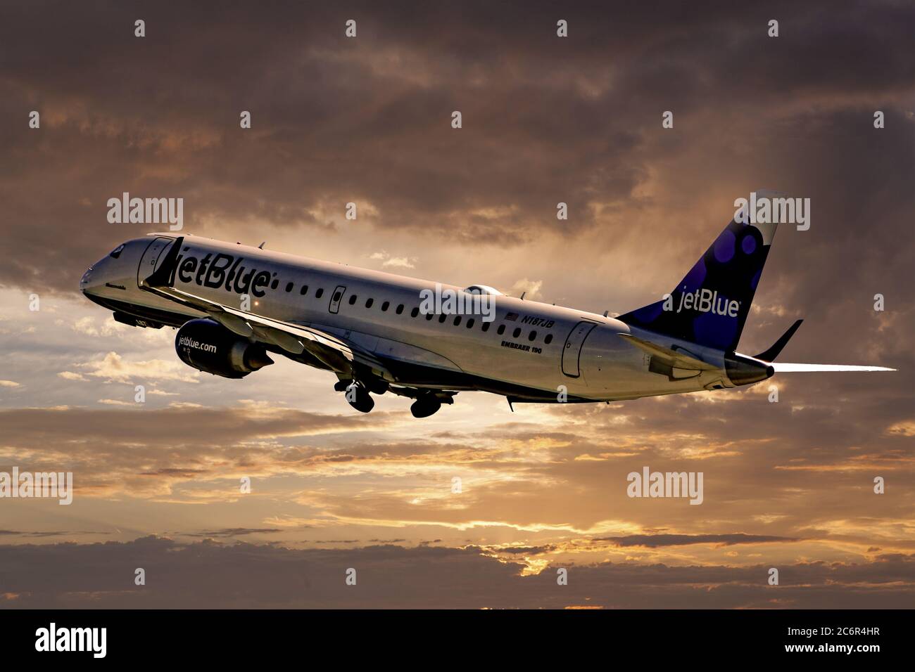 JetBlue Airlines CRJ-190 climbs out after take-off from Sarasota Airport in Florida Stock Photo