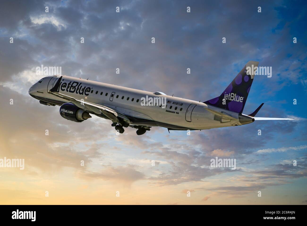 JetBlue Airlines CRJ190 climbs out after takeoff from Sarasota Airport in Florida Stock Photo