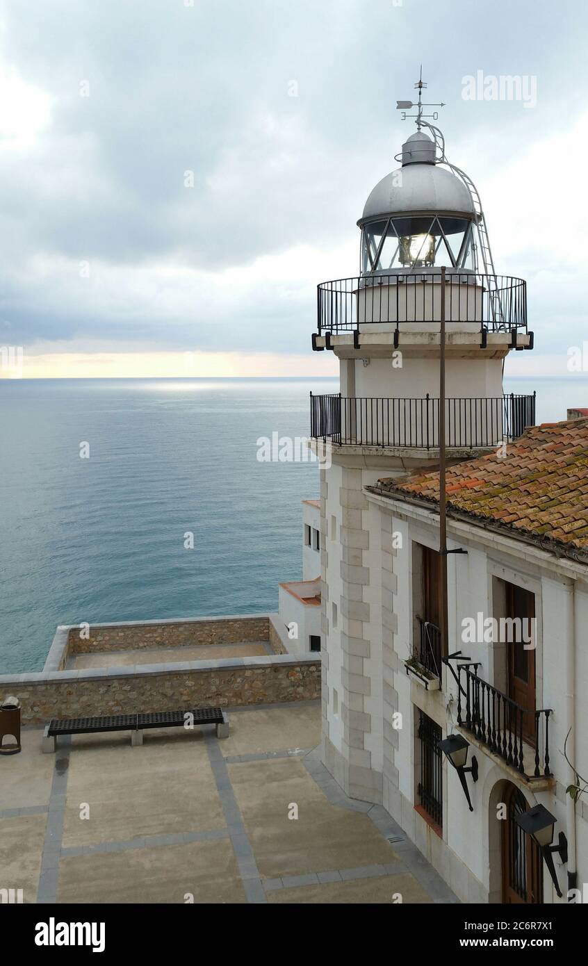 Sea lighthouse on village in Peniscola, Castellon Spain Stock Photo