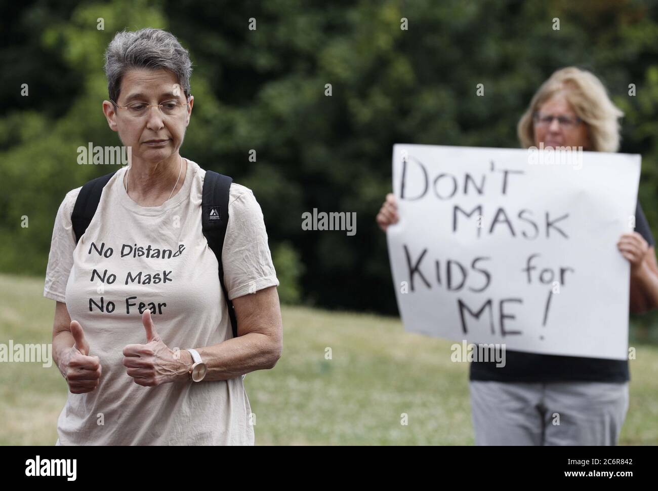 Cleveland, United States. 11th July, 2020. Janet Levitan, a local Physician, gives the thumbs up after giving an interview during a protest against Ohio's face covering order in the wake of the Coronavirus (COVID-19) at Edgewater Park in Cleveland, Ohio on Saturday, July 11, 2020. Photo by Aaron Josefczyk/UPI Credit: UPI/Alamy Live News Stock Photo