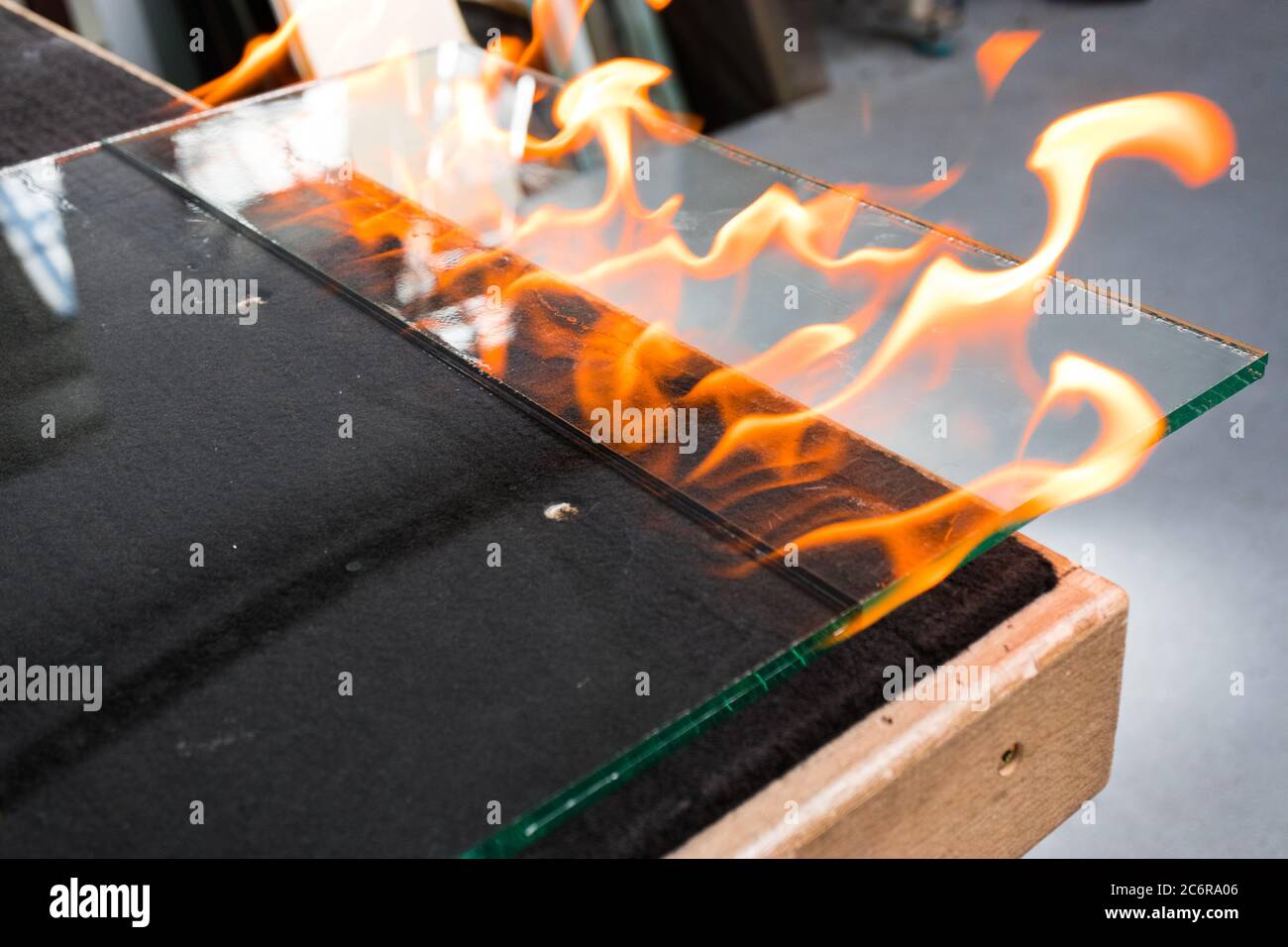 Cutting glass called VSG. (Very Safe Glass) Fire burning the foil