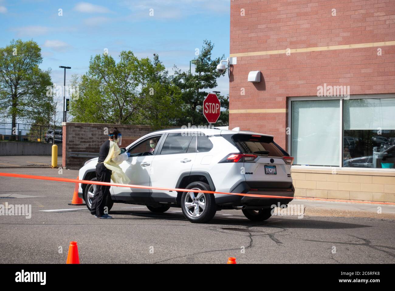 Car stopping for coronavirus outdoor testing at Health East Clinic. St Paul Minnesota MN USA Stock Photo