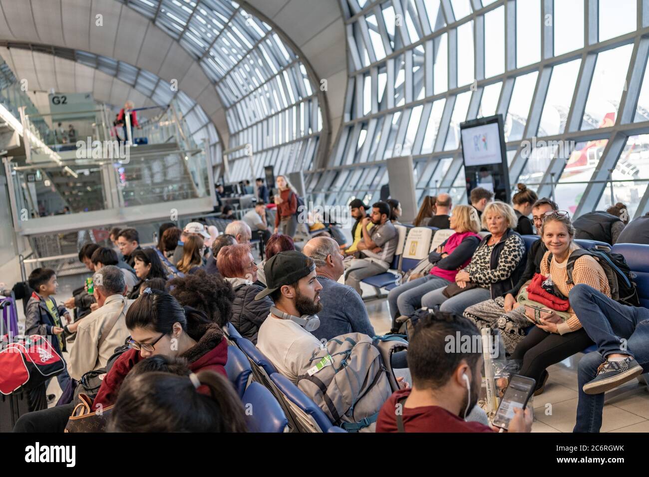 Bangkok, Thailand - 14 December 2019 - Passengers wait to board their flight at Suvarnabhumi International Airport in Bangkok, Thailand on December 14 Stock Photo