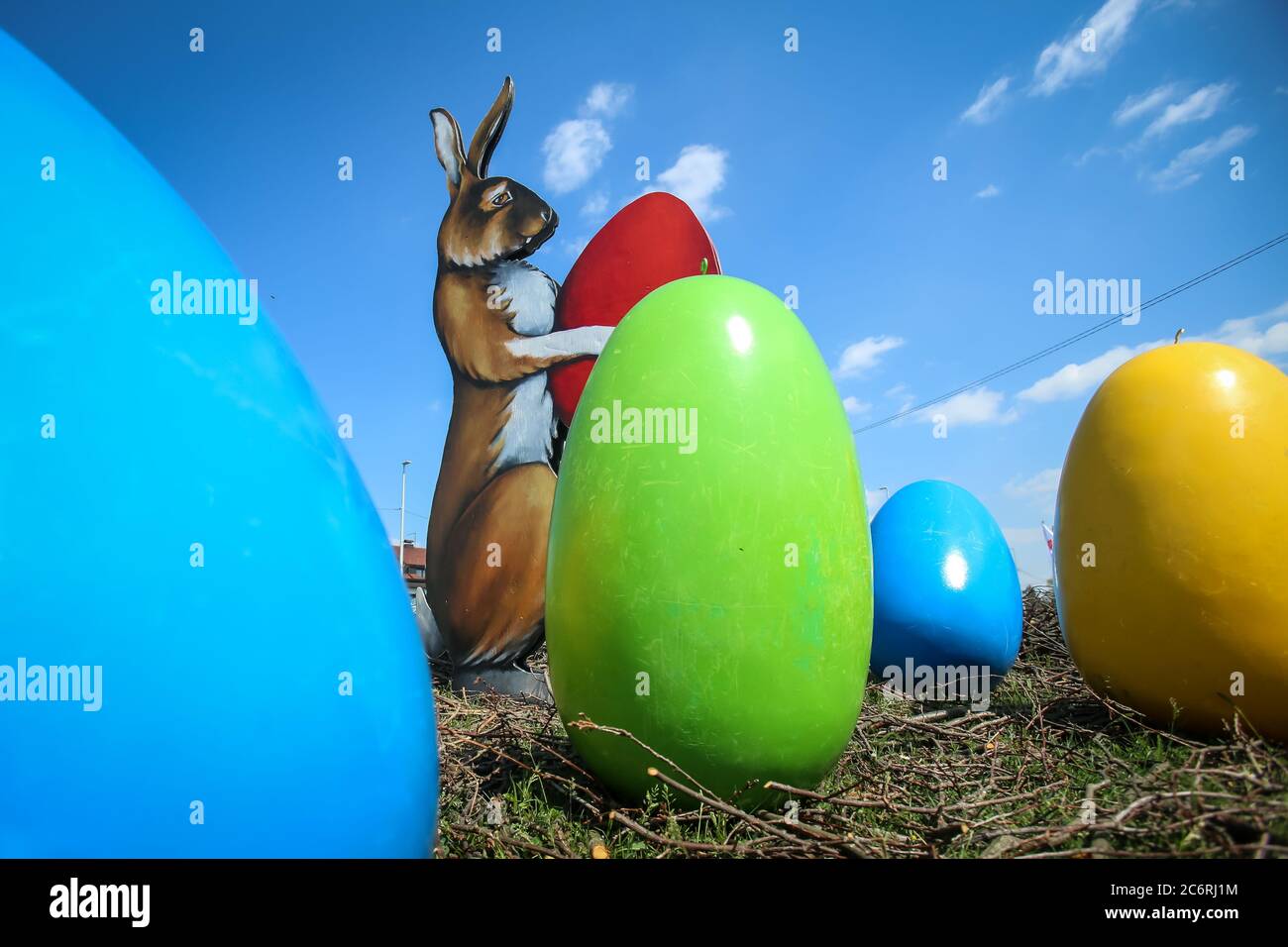Velika Gorica, Croatia - 21 April, 2017 : A sculpture of a rabbit holding an Easter egg in its paws and surrounded by Easter eggs on the streets of Ve Stock Photo