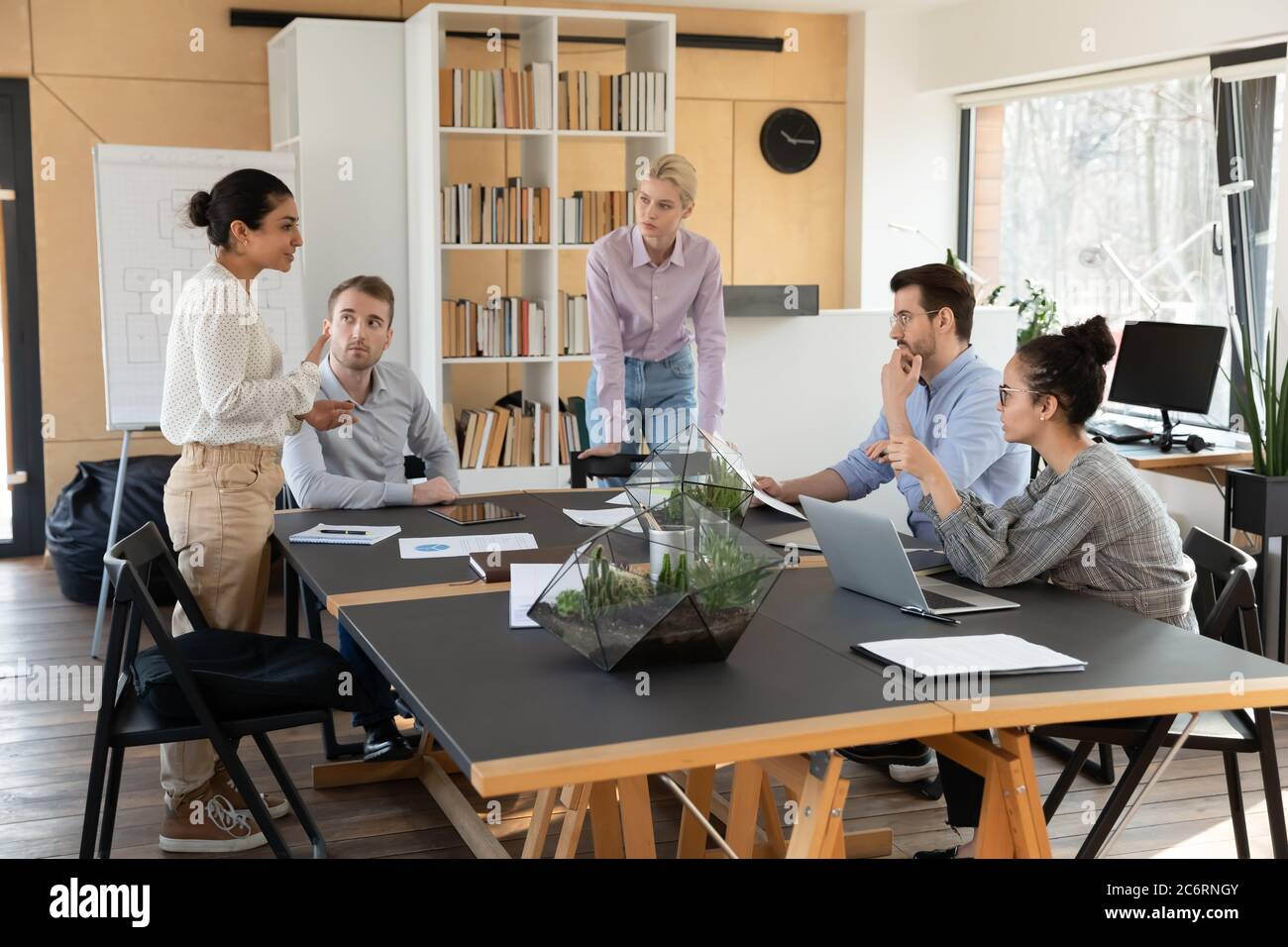 Multiethnic businesspeople brainstorm at team meeting in office Stock ...