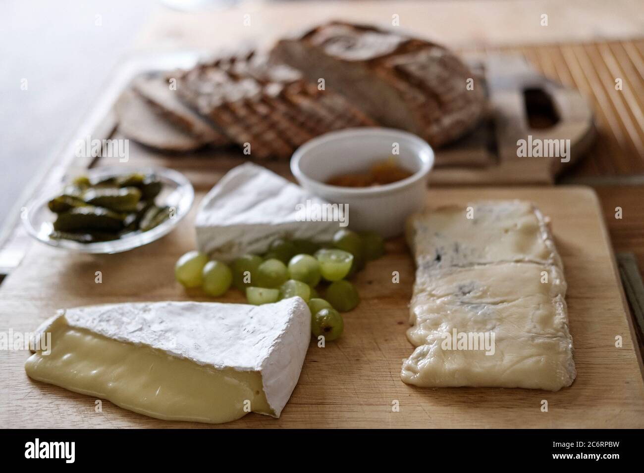 bread and ripe cheese selection served al fresco Stock Photo - Alamy