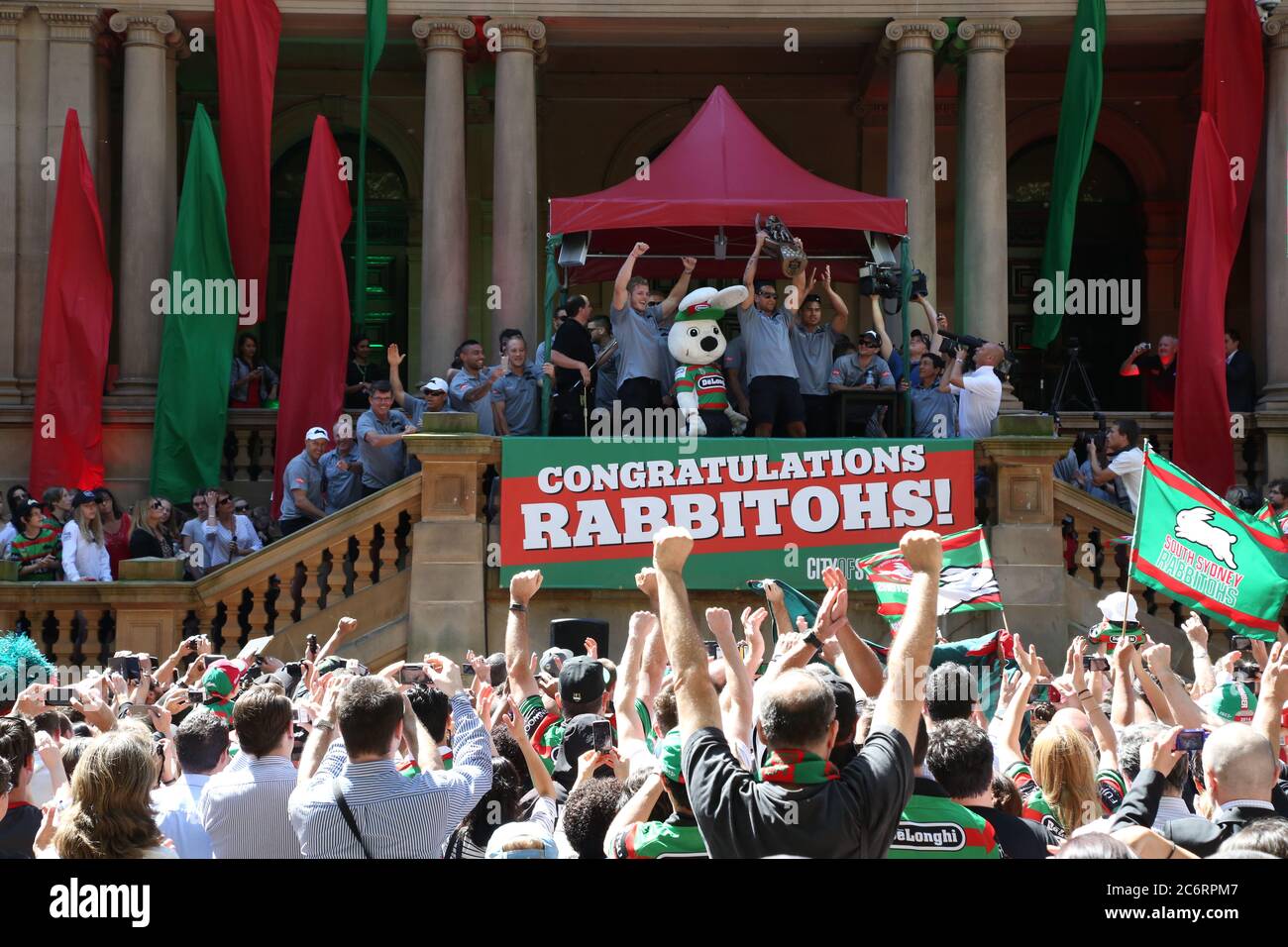 South Sydney Rabbitohs fans cheer as the team captain John Sutton lifts ...