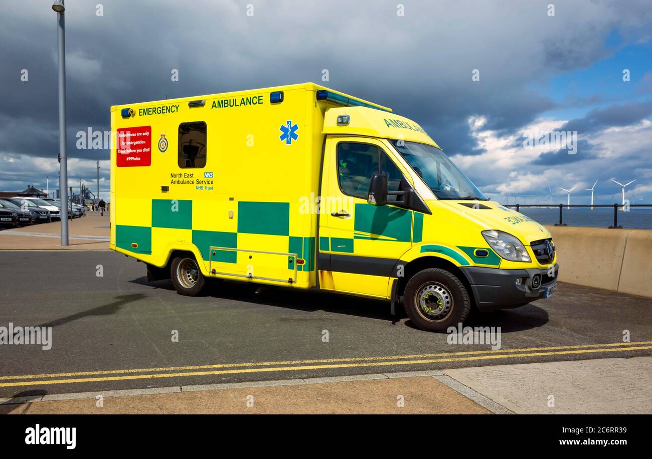 Emergency NHS ambulance on call on the sea front at Redcar North Yorkshire Stock Photo