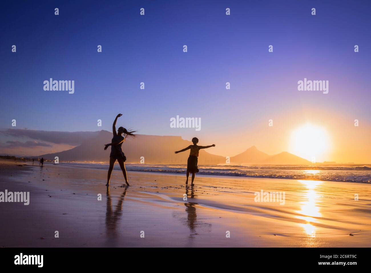 Two beautiful women dancing beach hi-res stock photography and images ...