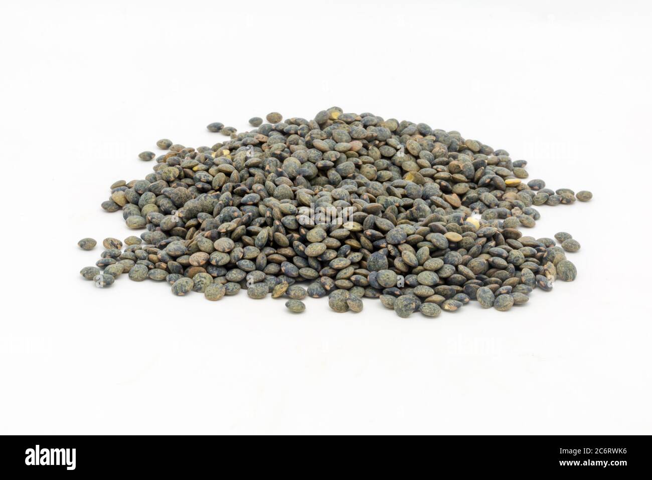 Dried puy lentils against a white background Stock Photo