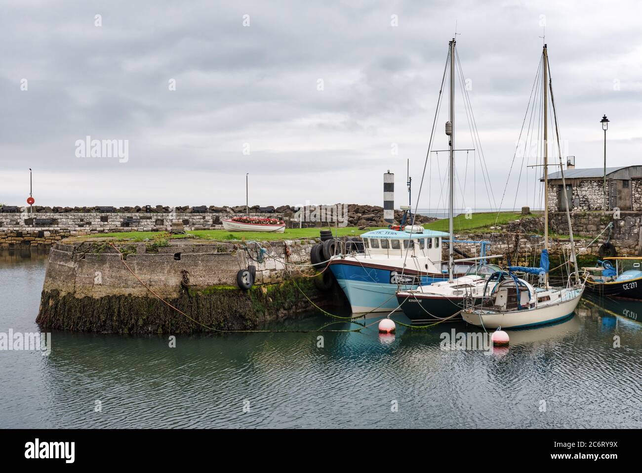 Carnlough, Northern Ireland- July 4, 2020: Fishing boats in Carnlough Harbor on the Antrim Coast in Northern Ireland Stock Photo