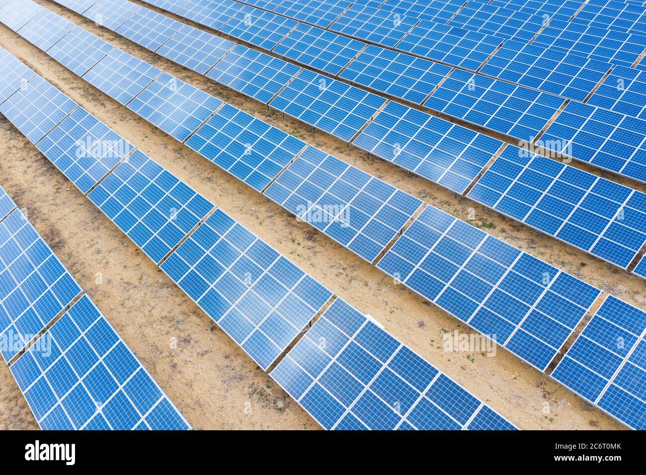 Aerial top view of Solar energy panels. Clean and renewable energy concept for a sustainable ecosystem. High quality photo. Stock Photo