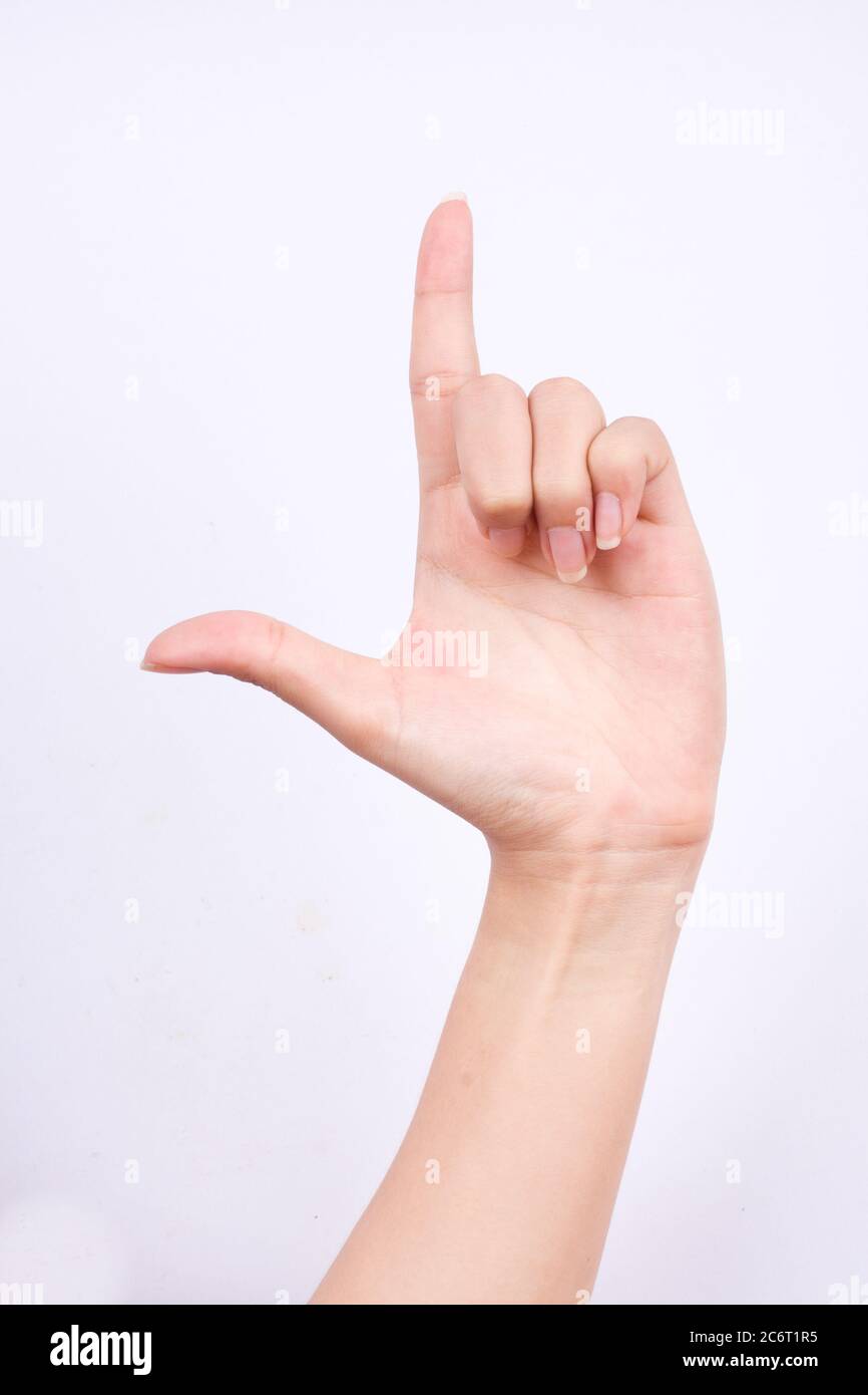 finger hand symbols isolated concept true alpha holding up the loser sign on the white background Stock Photo