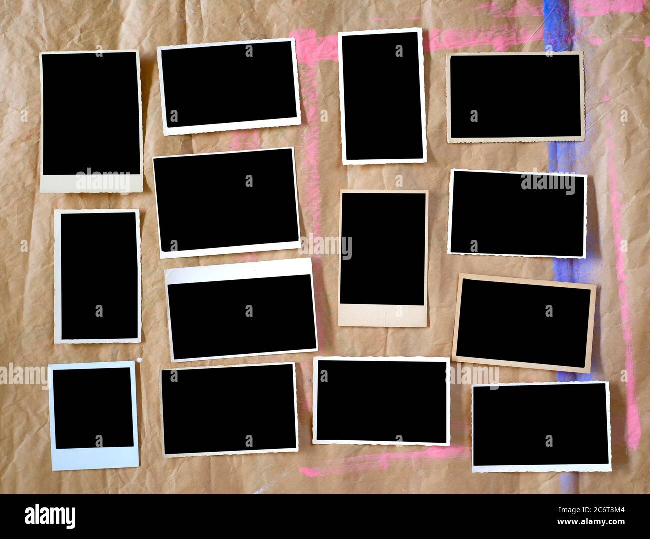 Set of vintage empty photographs,picture frames, flat lay on crumpled ...