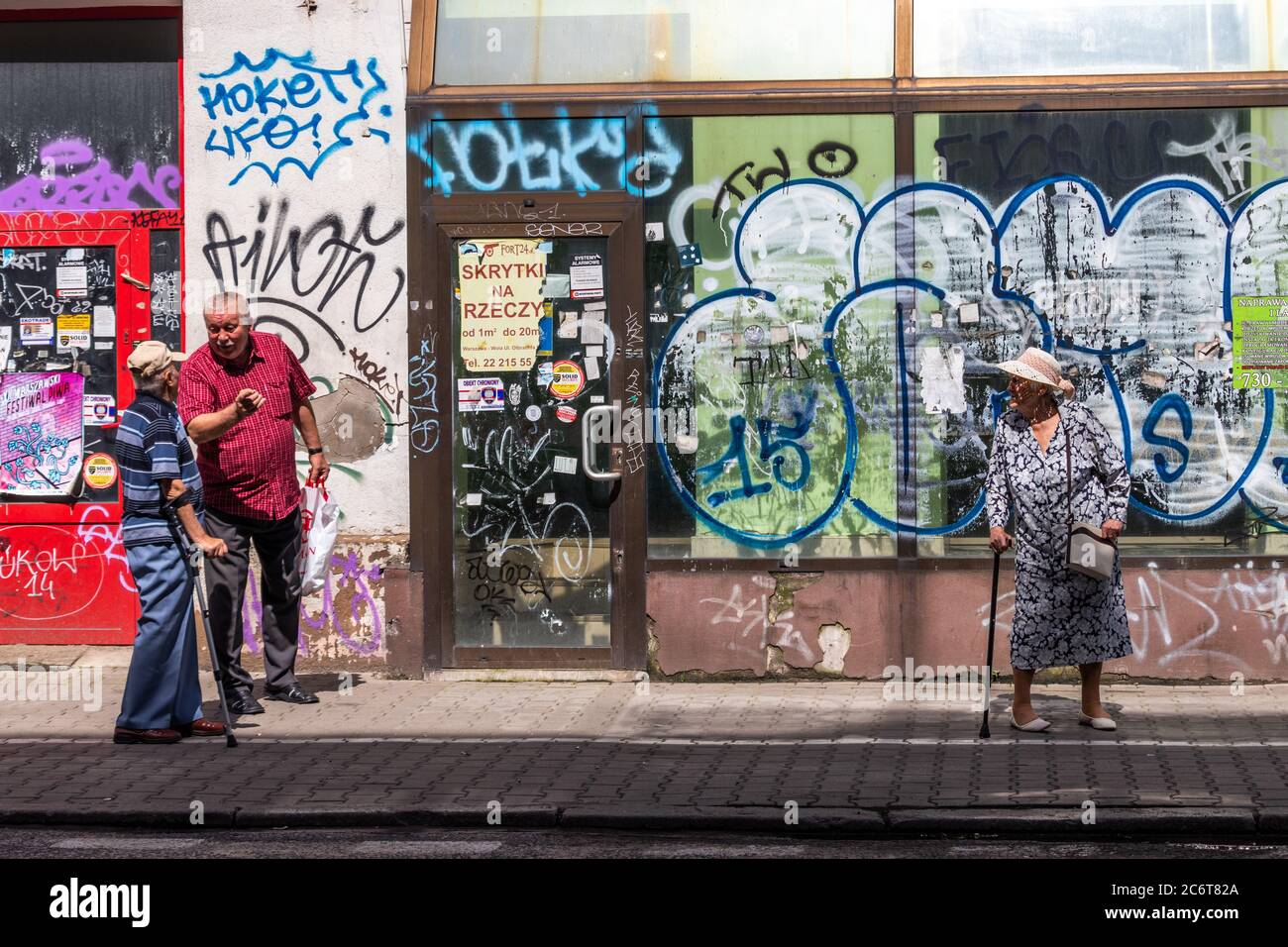 Warsaw, Poland. 12th Jul, 2020. Senior people walking on a street of central Warsaw. Poland decides today if the president will be the actual conservative president Andrzej Duda or the mayor of Warsaw Rafal Trzakowski. Credit: Dino Geromella / Alamy Live News Stock Photo