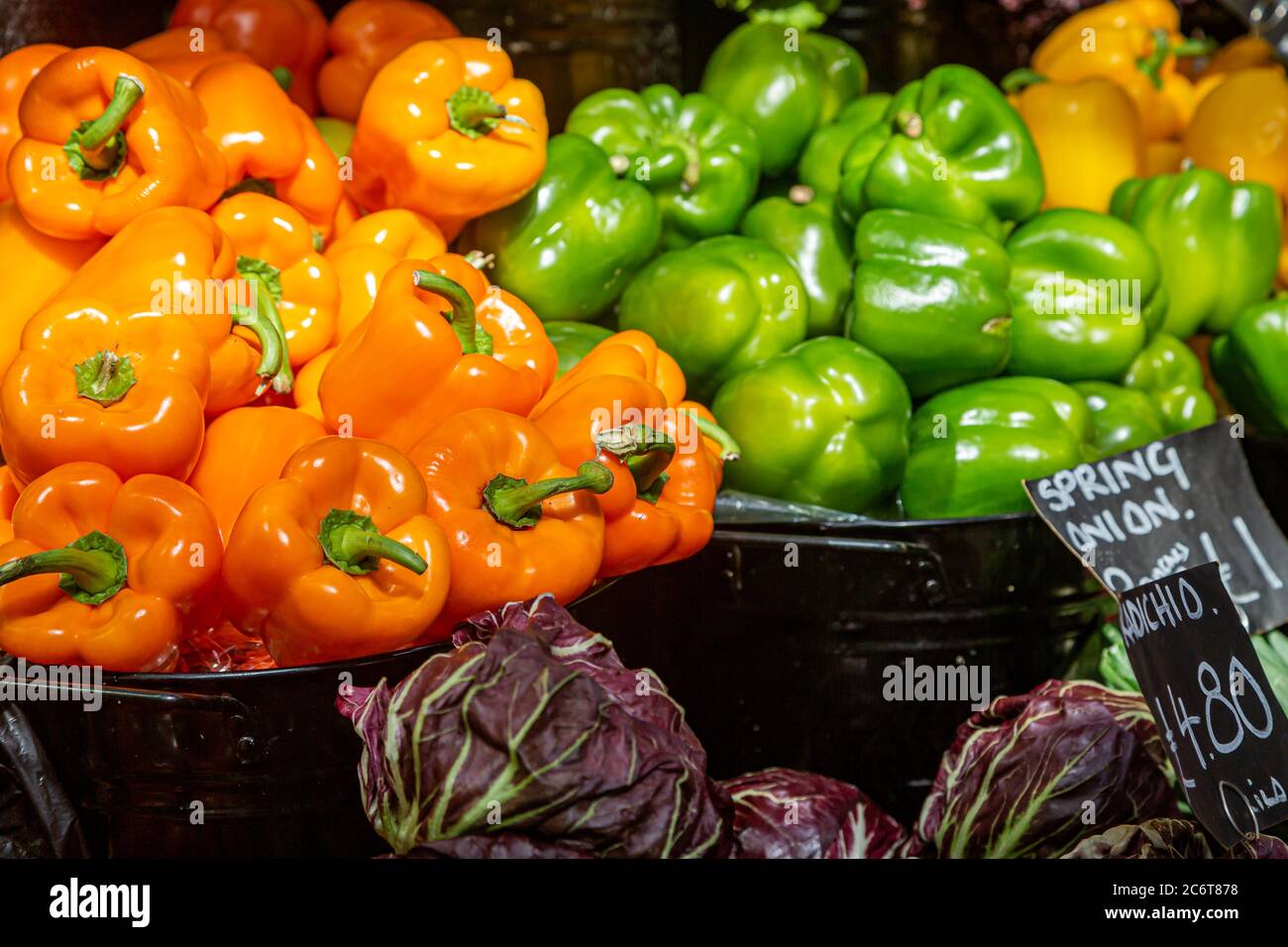 Colourful bell peppers for sale on a market stall Stock Photo - Alamy
