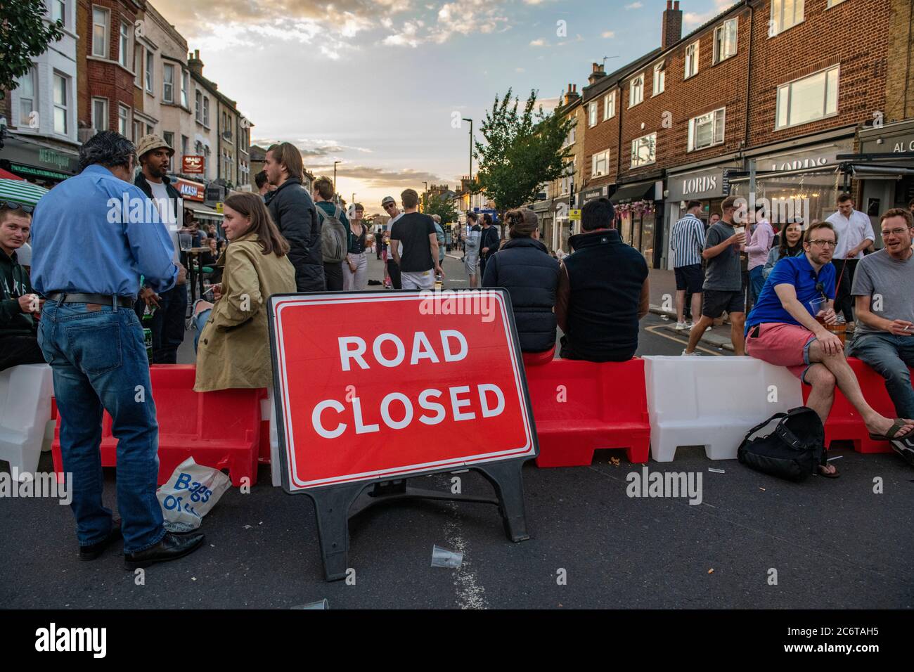 July 2020, with lockdown laws relaxed, Northcote Road in Clapham is pedestrianised to allow restaurants and bars to put tables in the road for diners Stock Photo