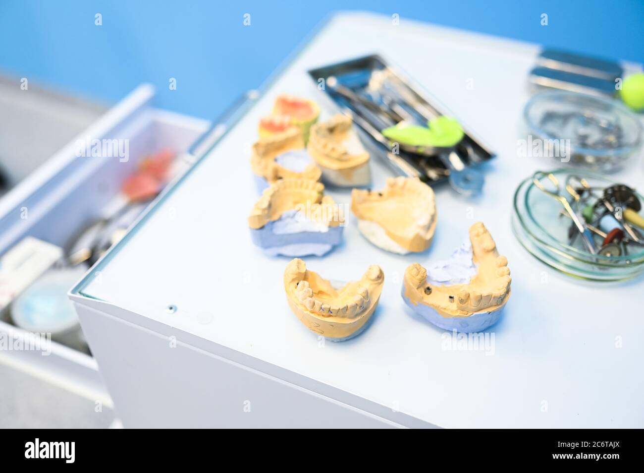 Different professional dental equipment, instruments and tools in a