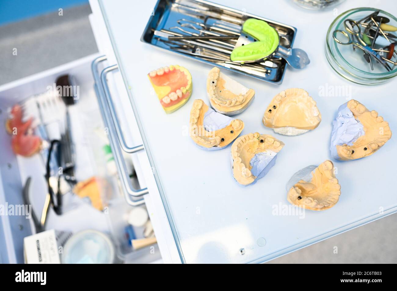 Different professional dental equipment, instruments and tools in a