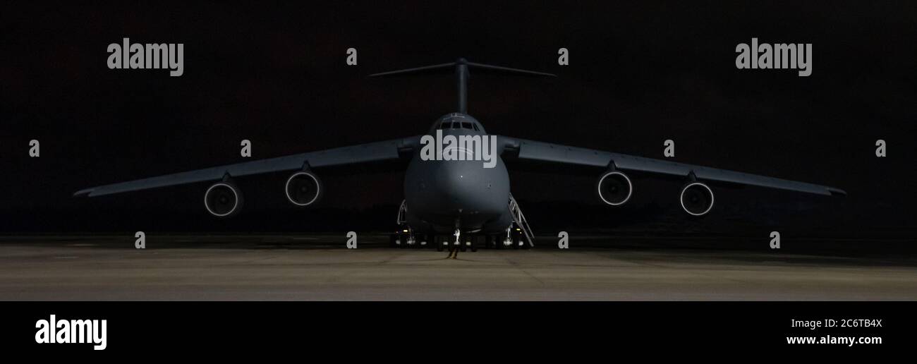 A nighttime front view of a United States Air Force C-5 Galaxy Stock Photo