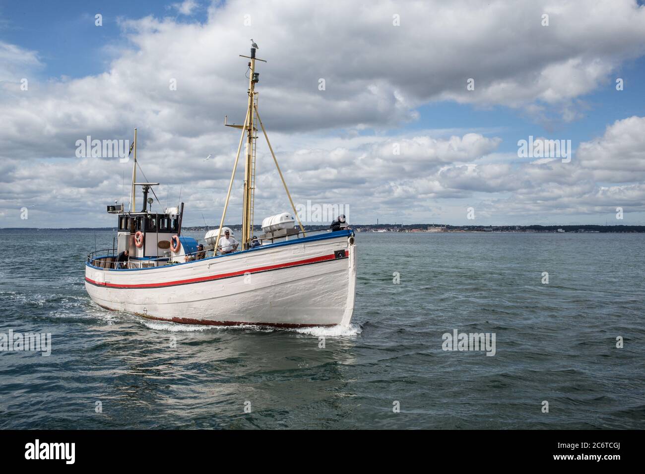 A boat heading in to the harbor in Helsingborg, Sweden Stock Photo