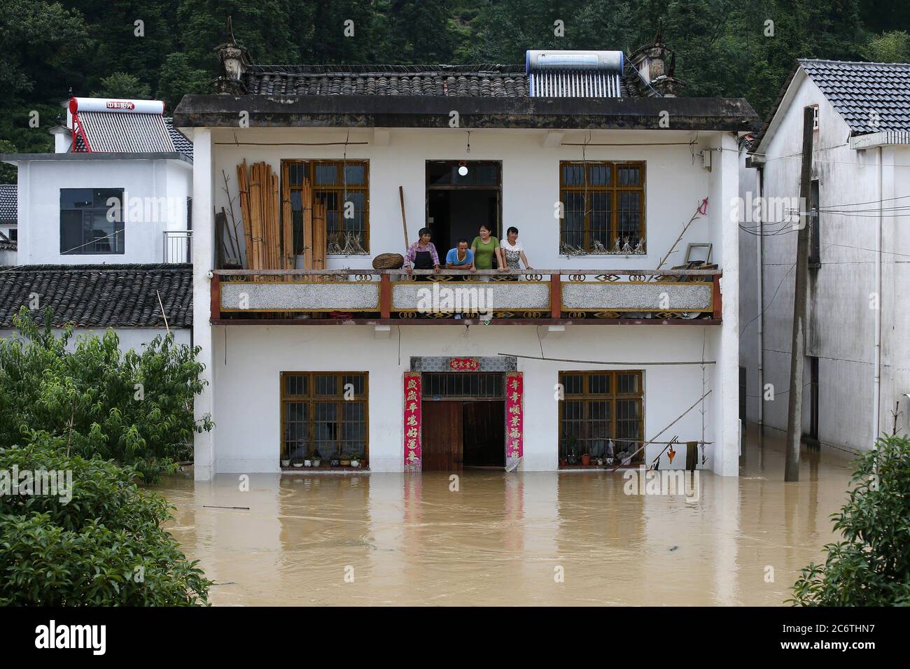 Huangshan, Huangshan, China. 12th July, 2020. CHINA-Huangshan District, Huangshan City, Anhui Province, has been hit by heavy rain for several days, leading to floods in some areas. The local authorities have urgently dispatched boats and kayaks to evacuate the trapped people. It is reported that the average rainfall in Huangshan District of Huangshan City, Anhui Province was 83mm from 22:00 on July 5 to 10:00 on July 6. The rainfall in many towns exceeded 100mm, with the maximum rainfall reaching 152.2mm. Credit: SIPA Asia/ZUMA Wire/Alamy Live News Stock Photo