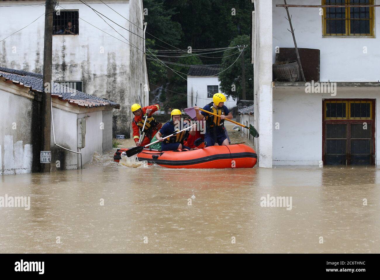 Huangshan, Huangshan, China. 12th July, 2020. CHINA-Huangshan District, Huangshan City, Anhui Province, has been hit by heavy rain for several days, leading to floods in some areas. The local authorities have urgently dispatched boats and kayaks to evacuate the trapped people. It is reported that the average rainfall in Huangshan District of Huangshan City, Anhui Province was 83mm from 22:00 on July 5 to 10:00 on July 6. The rainfall in many towns exceeded 100mm, with the maximum rainfall reaching 152.2mm. Credit: SIPA Asia/ZUMA Wire/Alamy Live News Stock Photo