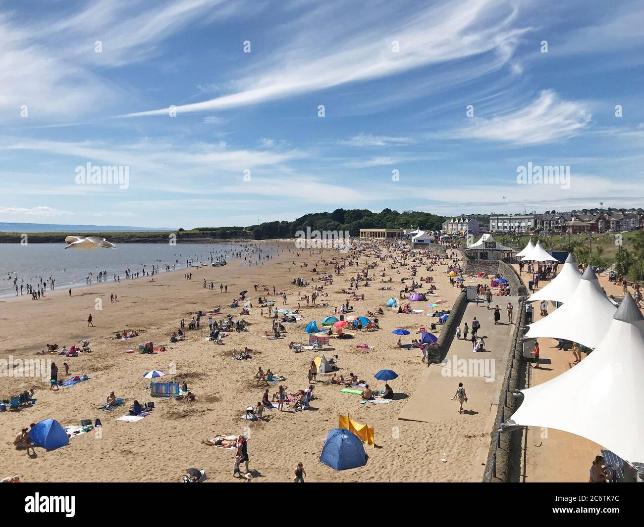Warm weather on whitmore bay beach hires stock photography and images