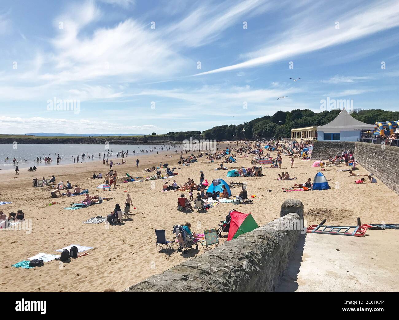 Warm weather on whitmore bay beach hires stock photography and images