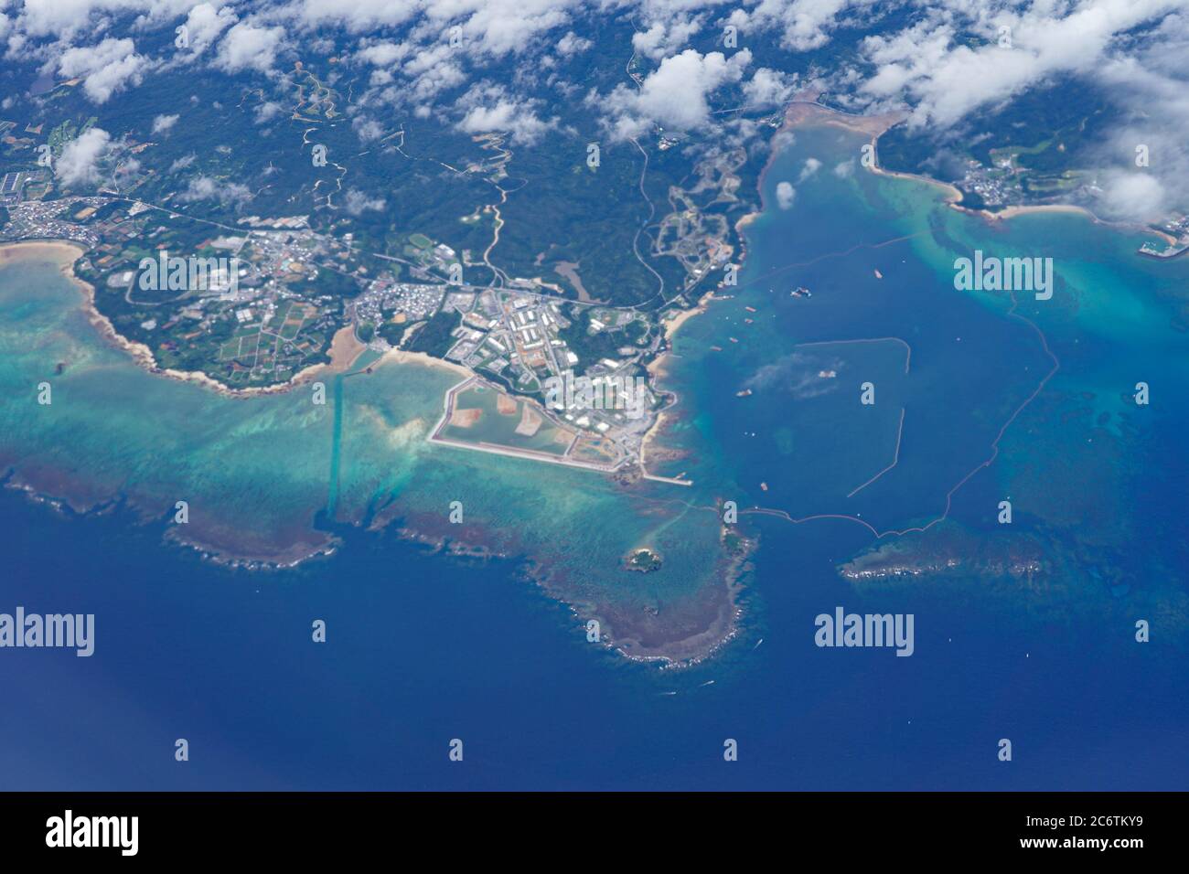 Nago, Japan. 03rd July, 2020. View of the northeastern coast of Okinawa island, where Marine Corps new airfield construction takes place. Japan pushes the controversial landfill work with its increased budget of $8.7 billion. Experts warn that the seabed stability is too weak and the embankment could collapse under its own weight. Credit: SOPA Images Limited/Alamy Live News Stock Photo