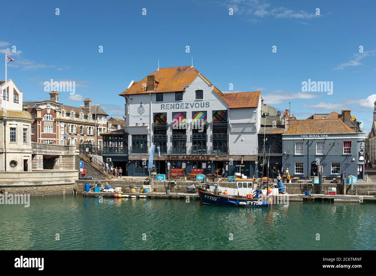 Rendezvous & The Royal Oak at the historic picturesque harbour in Weymouth, Dorset, England UK Stock Photo
