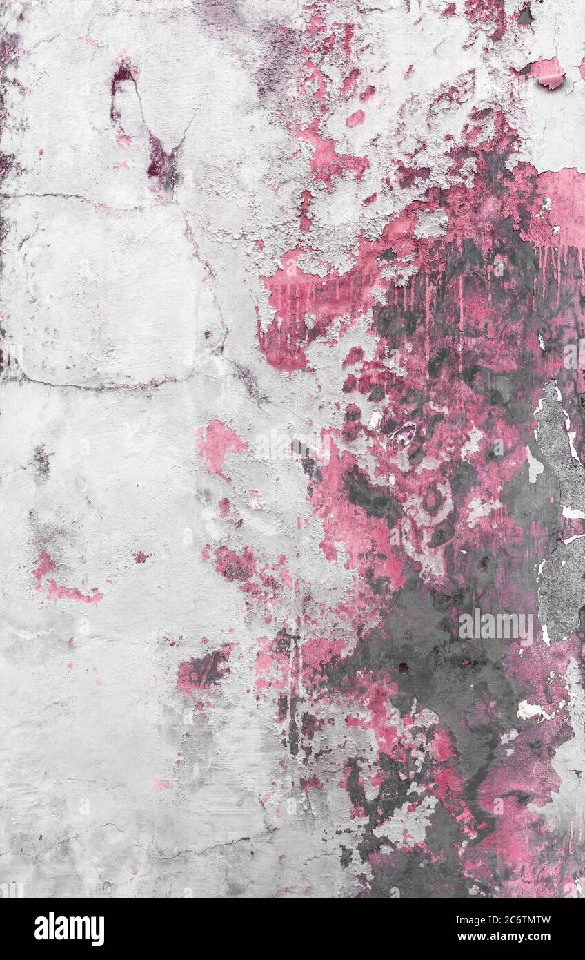 Pink peeled paint. Texture of grungy wall with pink paint peeling off. Stock Photo